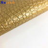 Pelle sintetica in PVC con motivo coccodrillo lucido