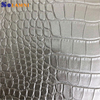 Pelle sintetica in PVC con motivo coccodrillo lucido