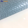 Pelle sintetica in PVC con motivo coccodrillo lucido