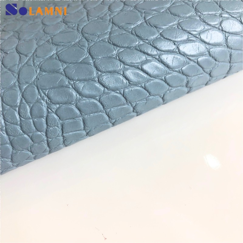 Pelle sintetica in PVC con motivo coccodrillo lucido